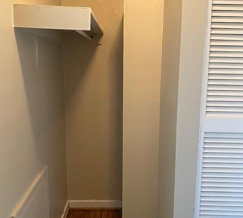 Clothes hanging area of the walk in closet