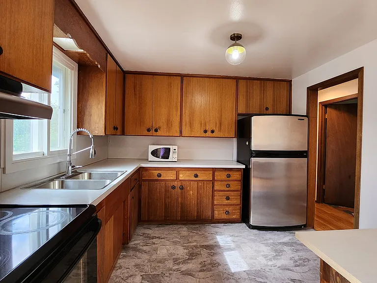 Original cabinetry in excellent condition. So much storage in this space.