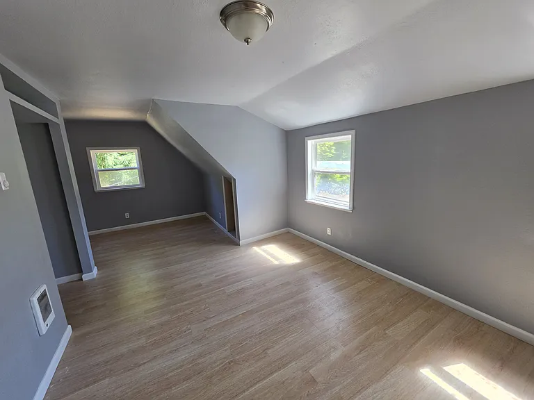 Upstairs primary bedroom (view from entry)