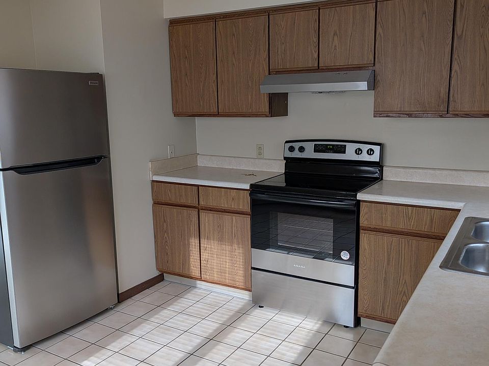 Large kitchen with stainless appliances