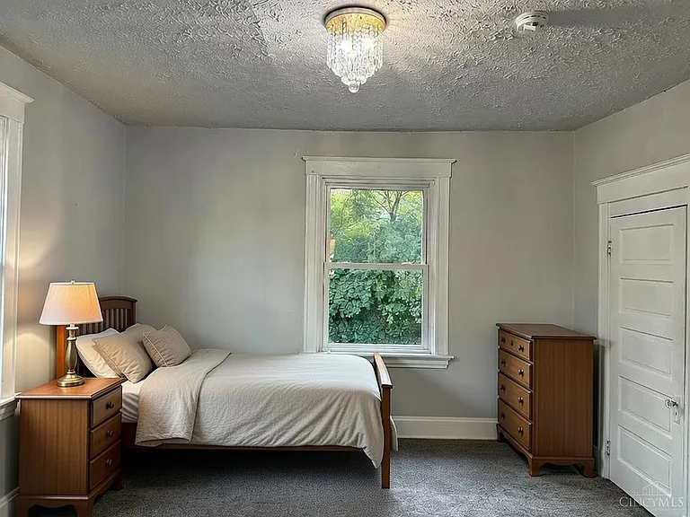 9' x 11' Bedroom with 9' ceiling and two closets