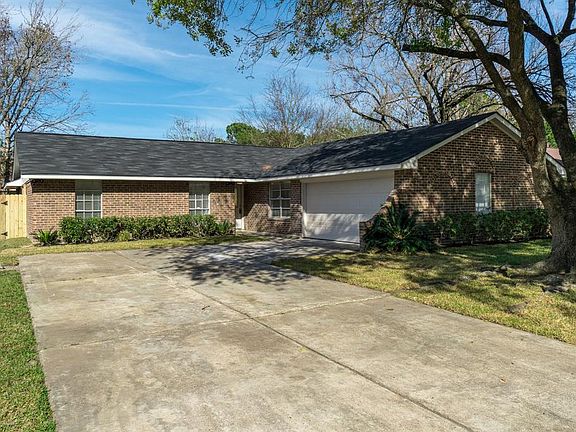Lovely curb appeal with mature trees
