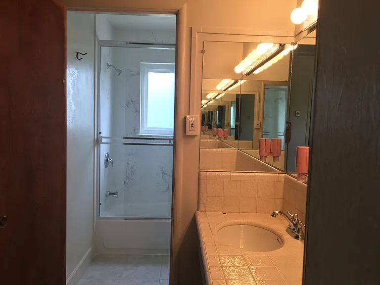 Master vanity area and bathroom.