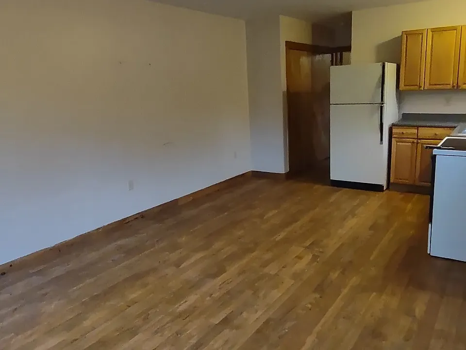 Enter your front door to the open concept living room and kitchen