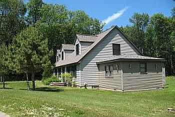 This is a view of the east side of the home, here you see the art studio addition off the master bedroom, it could be a great mother-in-law suite if needed.