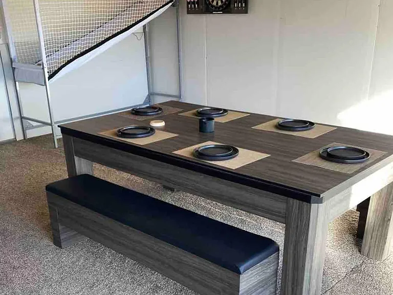 Pool Table can be converted into a large sitting table or card table. The reverse side of the ping ping table is a table top!