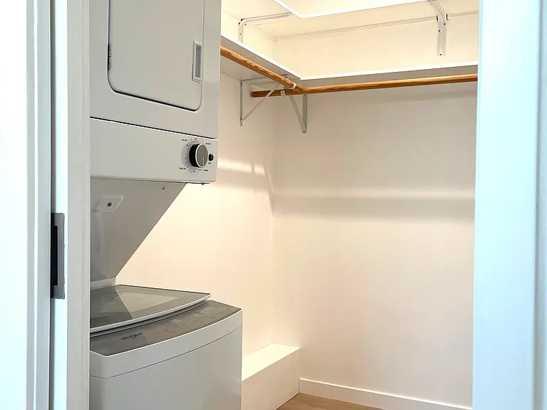 Laundry machine (washer and dryer) is inside the bed room walk-in closet.