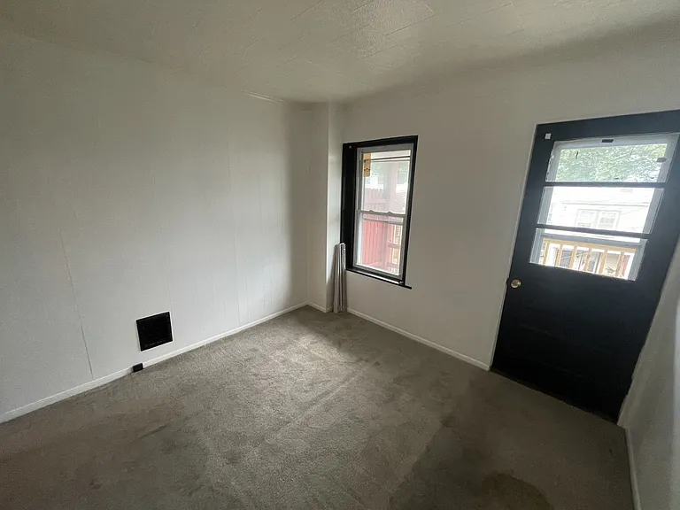 Bedroom with 2nd floor balcony