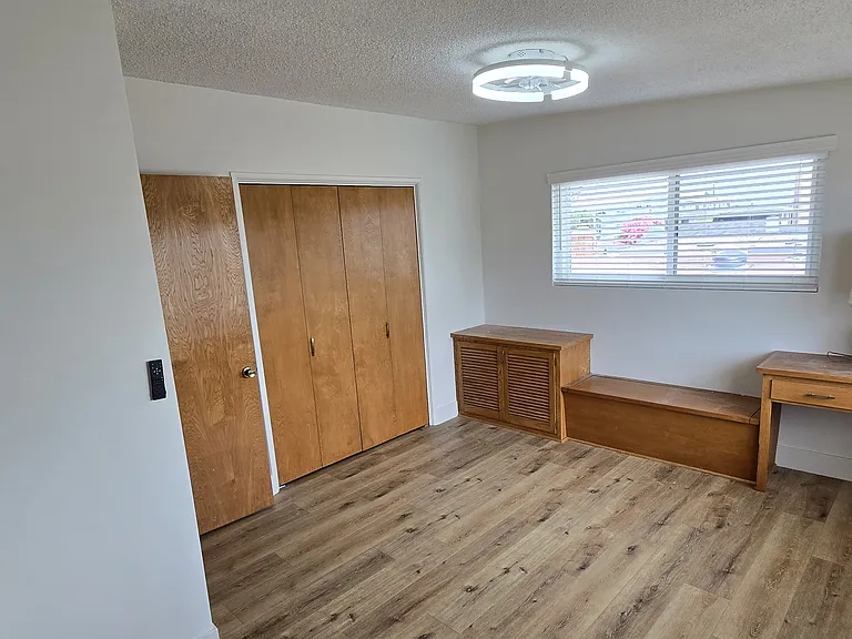 Bedroom #5 features built in desk and storage chest