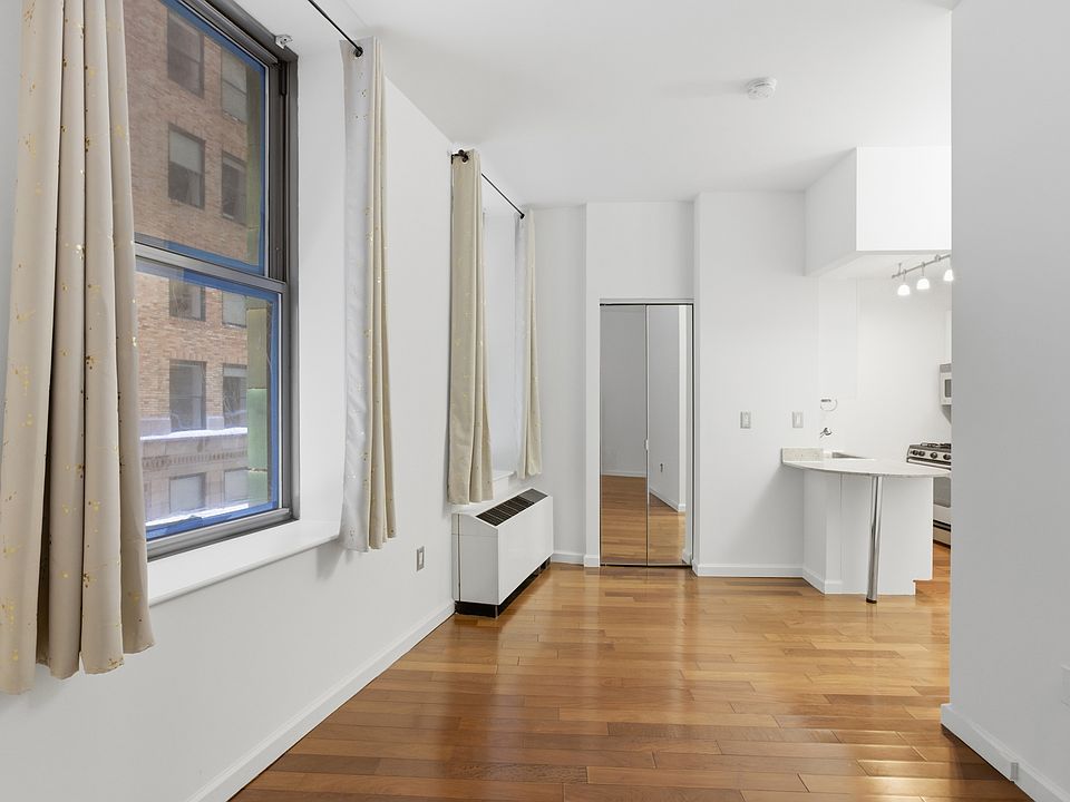 1st image of 1 Wall Street Ct APT 406