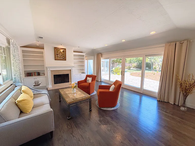 Formal living room back with beautiful backyard view