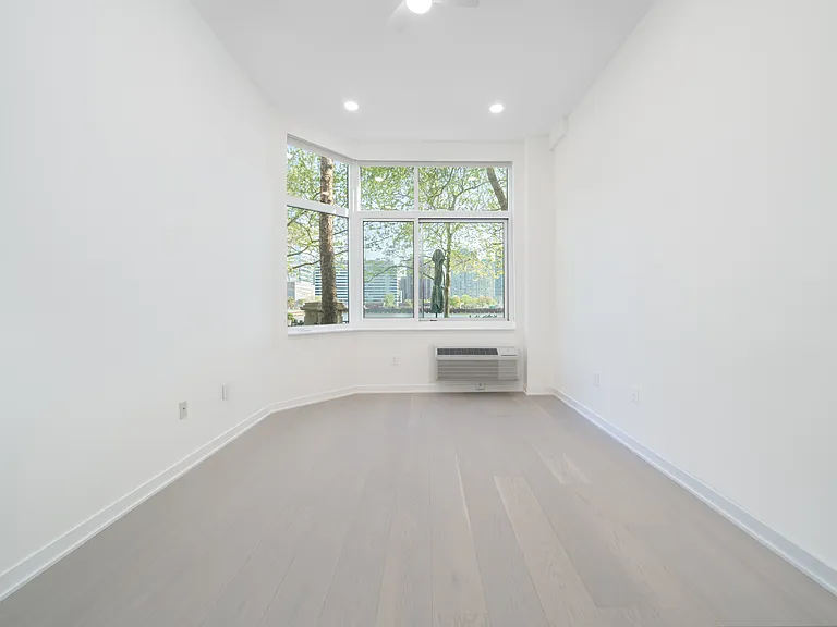 Bedroom with PTAC units that heat and cool