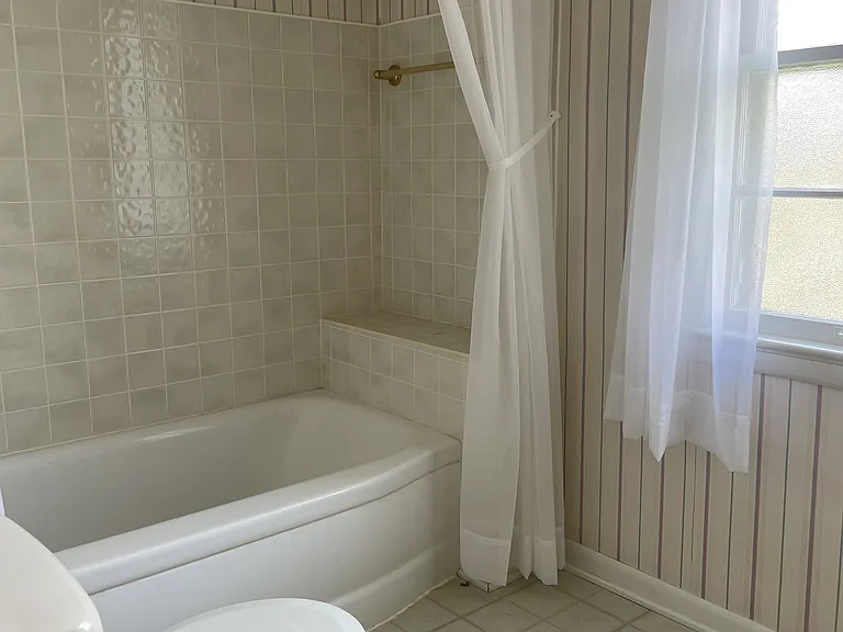 Second floor bathroom is clean and bright