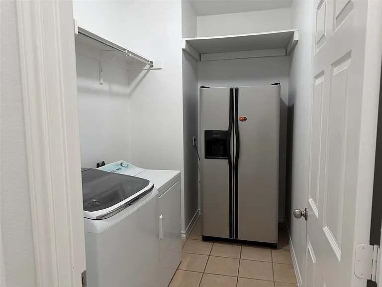 Over-sized laundry room with drip-dry area.