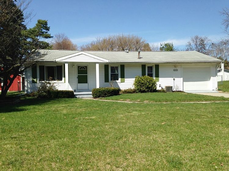 WHY RENT WHEN YOU CAN OWN THIS AFFORDABLE HOME!! Great location! Generous size lot with fenced backyard and deck. Attached 1.5 car garage. Newer windows, laminate flooring and kitchen cabinets. Remodeled bathroom. The office could easily be made into a third bedroom. All of the appliances are included. Central Air. Front covered porch. Move in ready!!