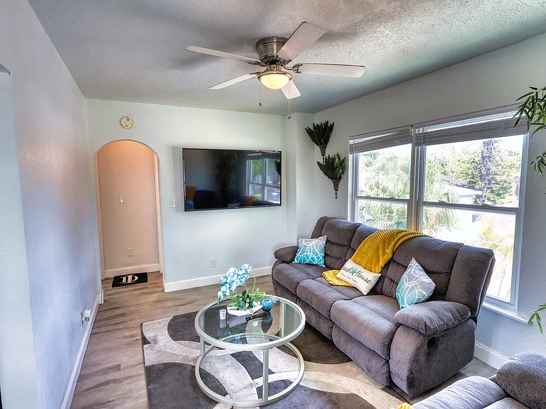 Unit is professionally staged; furniture and decor shown in photos are not included. Rented unfurnished.