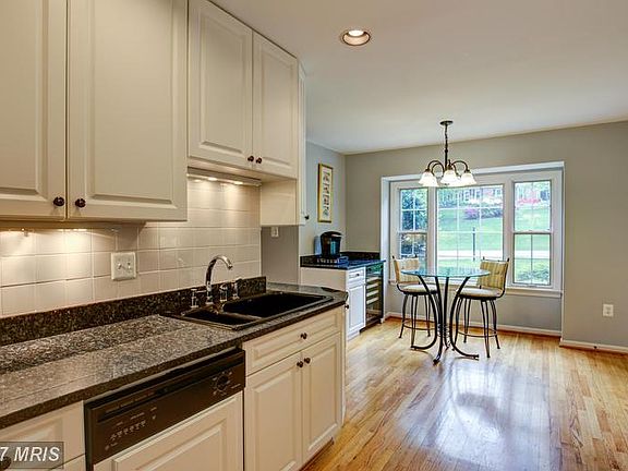 Remodeled Gourmet Kitchen with Hardwood Flooring