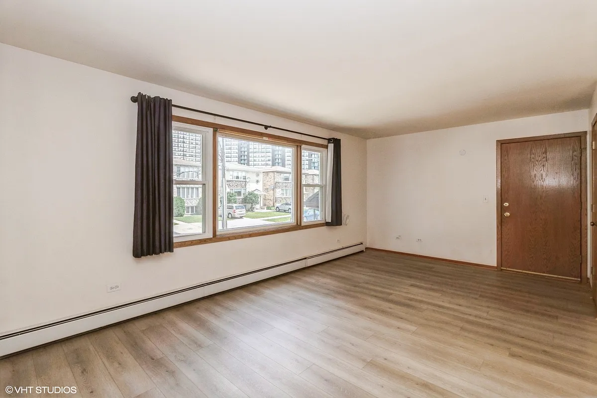 Building Photo - 8653 W Catherine Ave #1