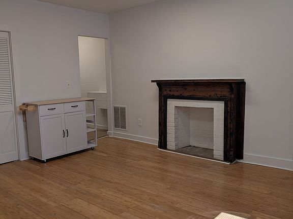 LR toward Galley Kitchen showing portable kitchen island