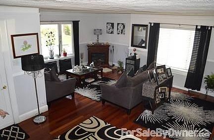Spacious Living Room
						:
						Hardwood floors