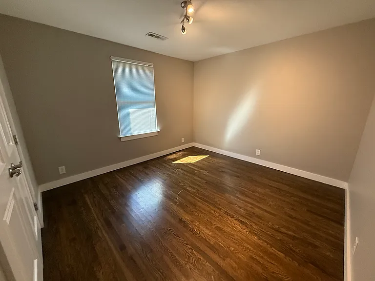 Front bedroom/ closet/ real hardwood floors