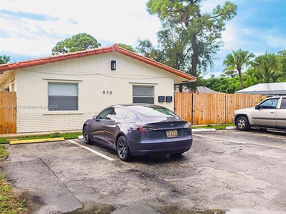 Feels like a Single Family Home, Unit has two entrances. Two Parking Spaces.