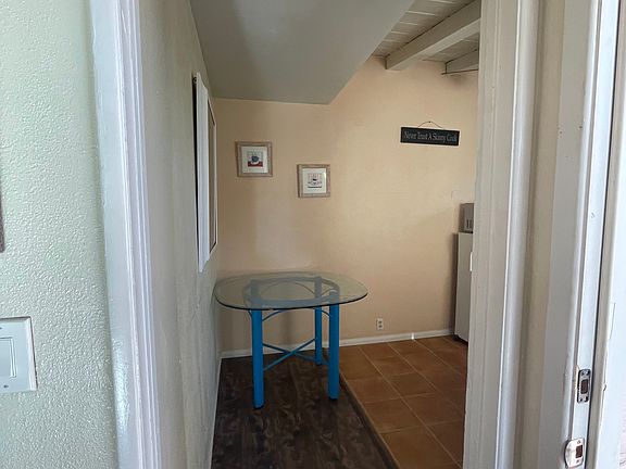 kitchen comes with a glass table