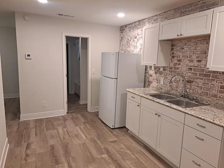Kitchen. New cabinets, counter top and refrigerator brand new.