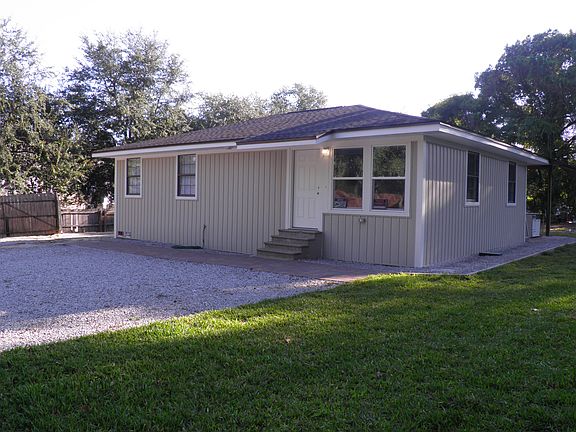 Newly Sodded front yard. Final cleanup and landscaping underway.