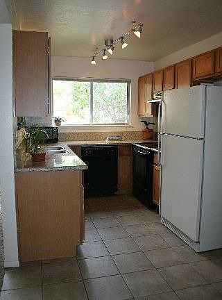 Kitchen w/ window to Backyard