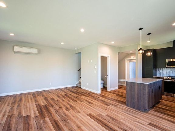 Downstairs Kitchen, Living, & Dining - Open Floor Concept