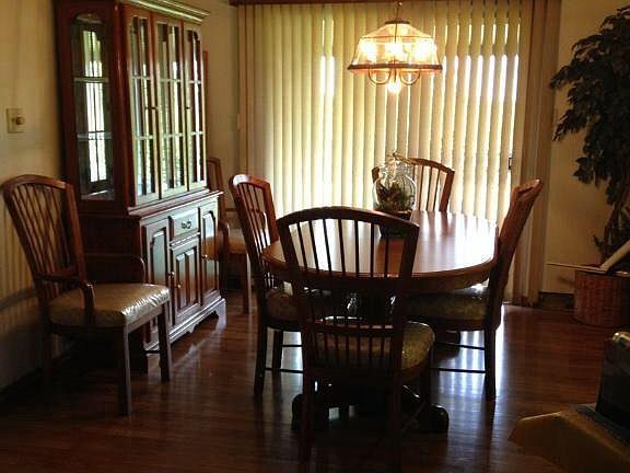 Dining Room With Sliding Glass Door To Covered Rear Porch