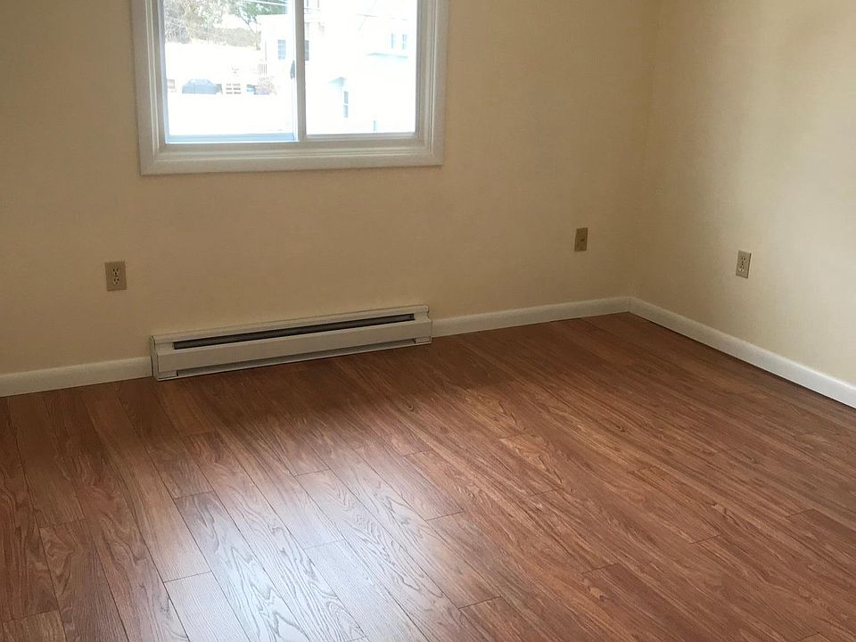 Living room- new flooring, fresh clean paint!