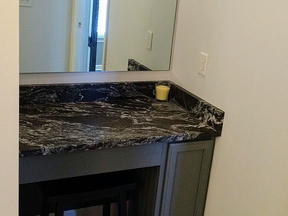 Separate "hers" granite vani