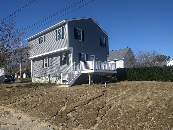 Back deck and spacious yard 