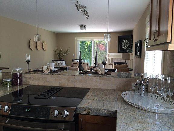 Kitchen View of Bar, Dining, Living Room