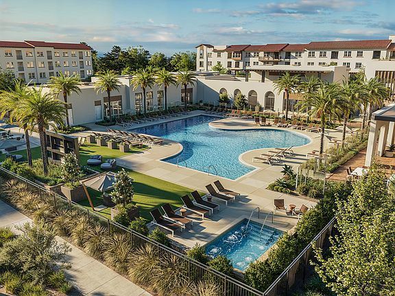 Resort-Style Pool and Spa with lounge chairs
