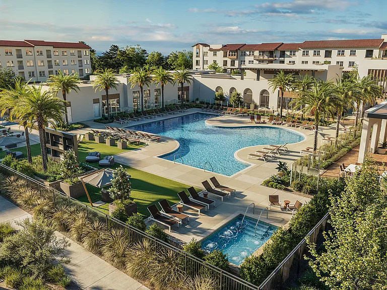 Resort-Style Pool and Spa with lounge chairs