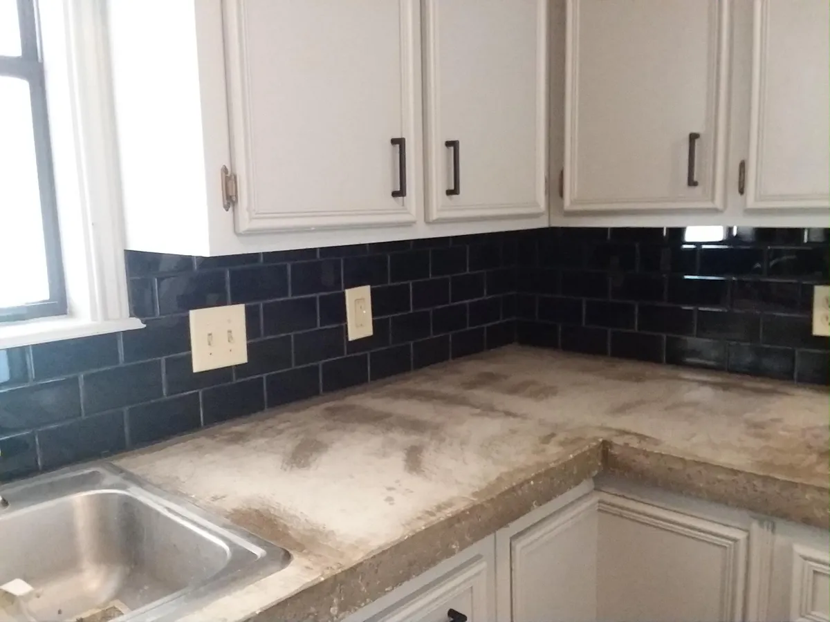 concrete countertops and subway tile in kitchen - 3607 S Old Bastrop Hwy