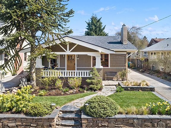 Picture perfect bungalow with gorgeous landscaping!
