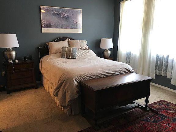 Master bedroom with queen bed