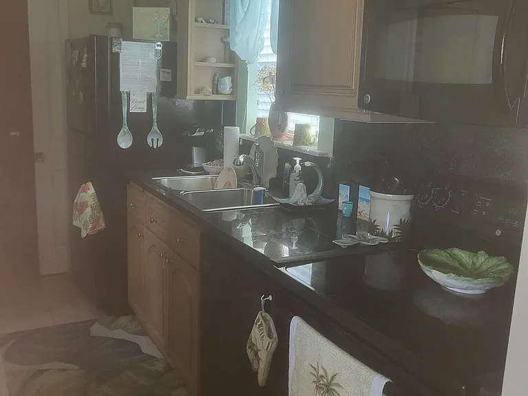 Full size appliances.. Tall cabinets; plenty of cupboard space. All kitchen dishes, glasses, pots and pans, utensils, etc you need