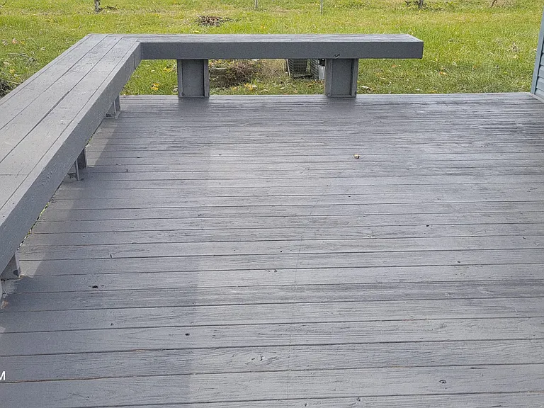Large patio freshly painted for family and friends' entertainment.