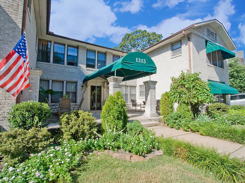 Front yard and patio at 1315 Kavanaugh. Apartment 7 is on the right side in the back of the building (upstairs).