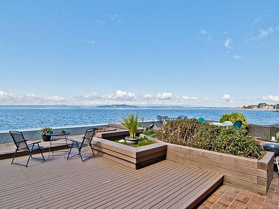 Fire pit, built in seating areas, and patio.