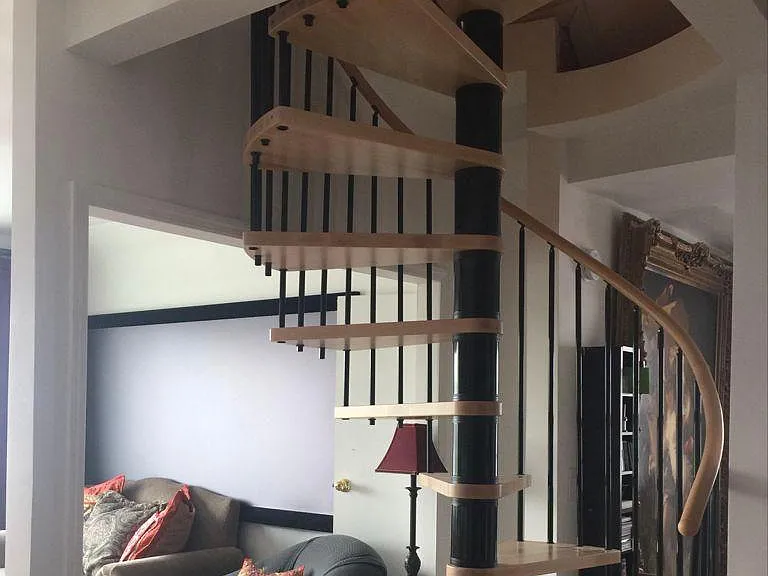 the interior spiral stair case leads you up to a loft. It is a cute space between the ceiling and the roof where you can sit lay down. You are welcome to use that space during spring and fall months. It is not suitable during winter nor summer as it ge