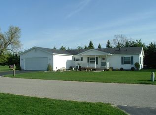 10335 Schooner Ln, Canadian Lakes, MI