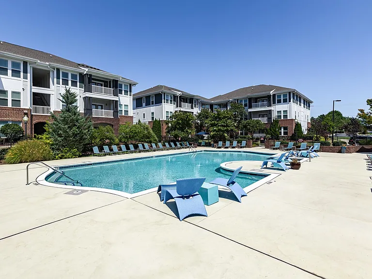 Sparkling Pool Area with Sun Deck