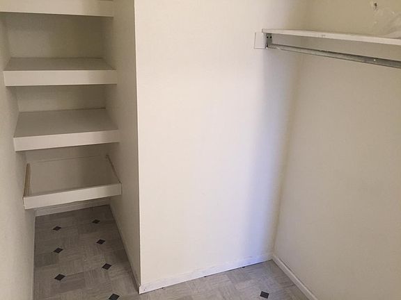 Large walk-in closet - lots of storage space