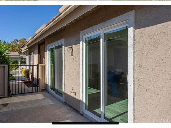 Sliders from dining area & kitchen access patio